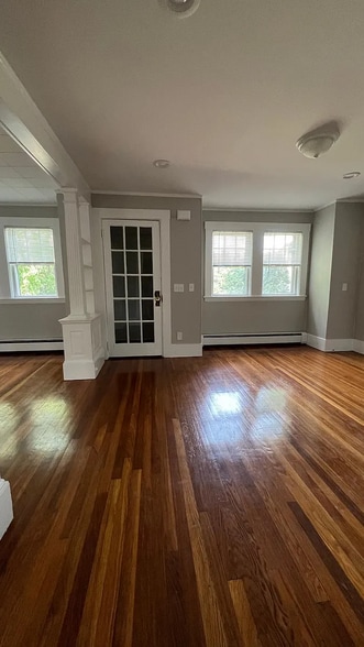 Living room looking into Front door - 102 Main St