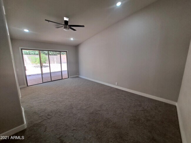 Building Photo - 9074 E Caribbean Ln