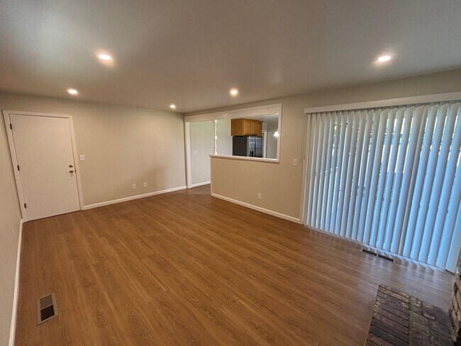 Building Photo - Updated Single level 3 bedroom 2 bathroom Bennett Valley Home with new paint and beautiful refini...