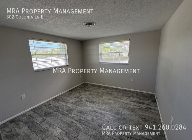 Building Photo - 302 Colonia Ln E