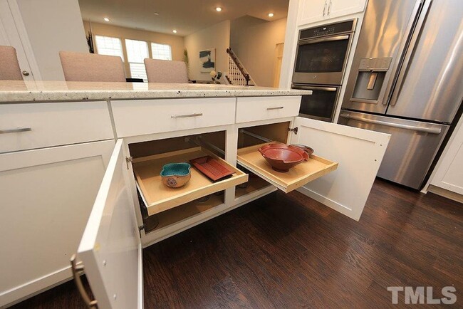 Building Photo - Main Floor Owner's Suite PLUS Main Floor G...