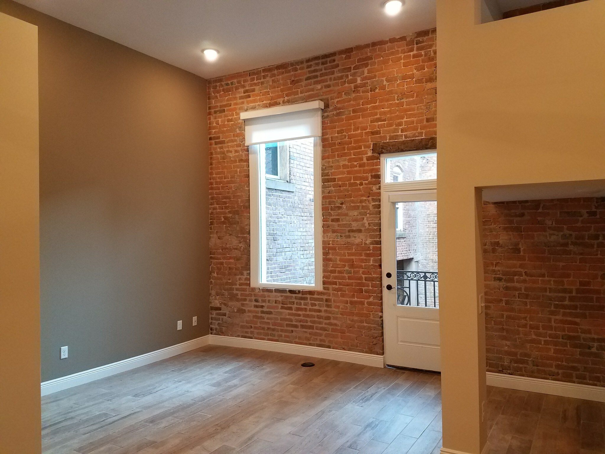 Window to Balcony - 114 E University St