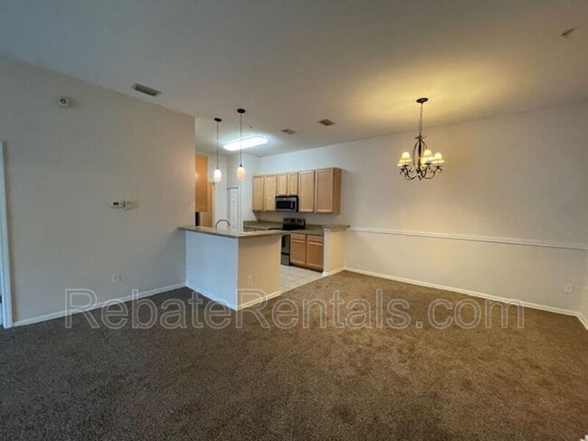 Building Photo - 7064 Deer Lodge Cir