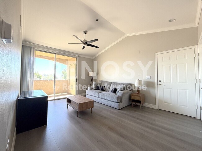 Building Photo - Top-Floor Condo in a Gated Community – Flexible Furnishing Options!