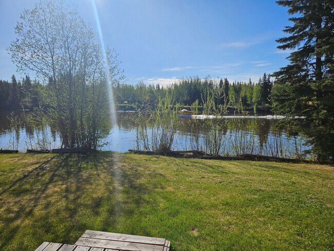 Building Photo - Right on the river! 2 Bedroom, 1.5 Bath, W/Garage, Duplex!