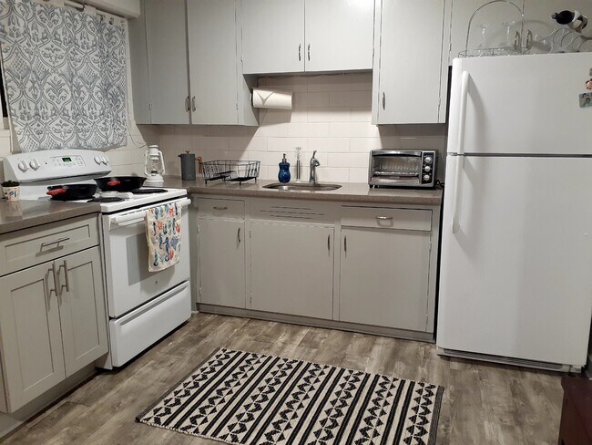Kitchen with Fridge - 946 Waiakamilo Rd