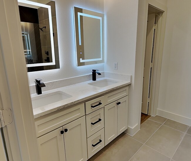 Building Photo - Brand New Modern Luxury with Soaring Ceilings & Designer Finishes!