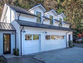 Building Photo - Expansive Loft-Style Carriage House in Private Haller Lake Estate