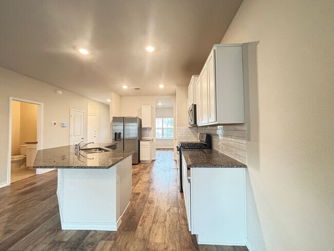 Building Photo - 5-Bedroom Home with Solar, Water Softener ...