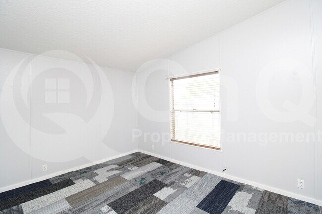 Building Photo - 9721 E Empress Ave