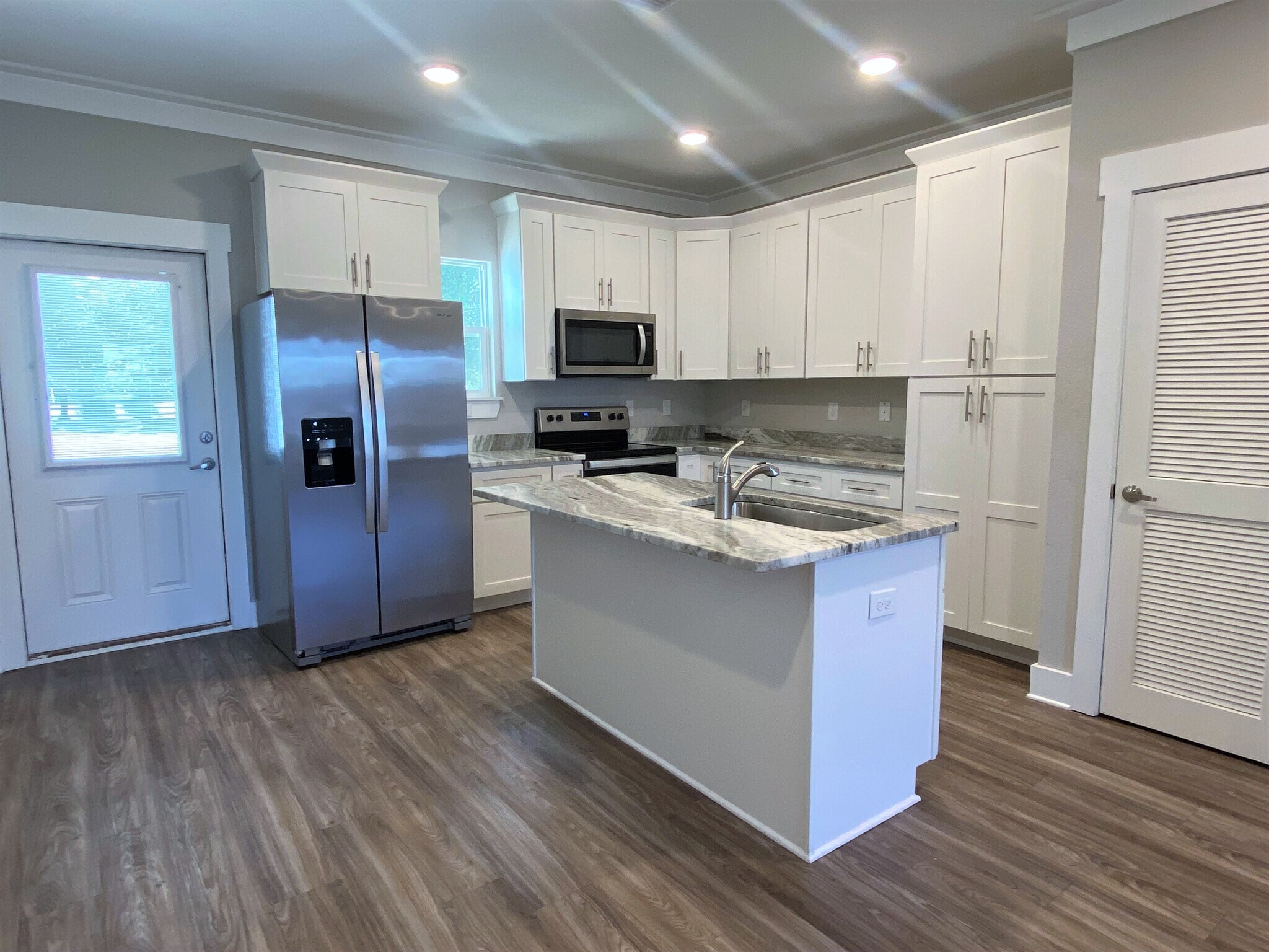 Kitchen & Door to Back Porch - 44 N Sand Palm Rd