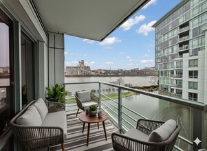 Building Photo - Exquisite Condominium at the Renowned Waterfront Pearl with Views of the River, Work Out Facility...