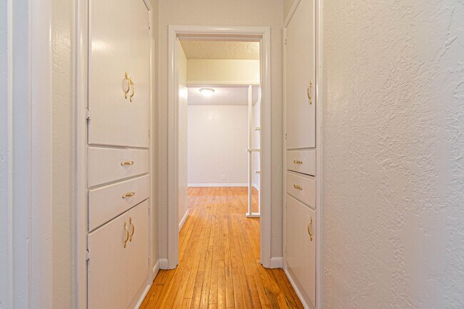 Building Photo - Three Bedroom Home in tree filled neighborhood! Lawn care included!