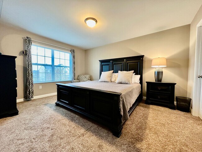 Building Photo - Executive corporate rental features community pool. Fully furnished and includes all utilities.