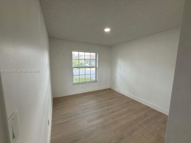 Building Photo - 9001 Jacaranda Ln