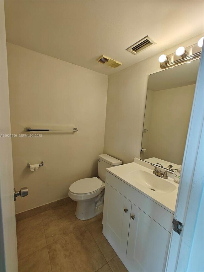 Building Photo - 8770 Royal Palm Blvd