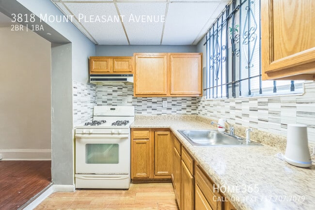 Building Photo - 3818 Mt Pleasant Ave