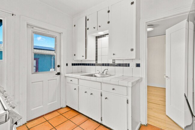 Building Photo - Move In Special!!  Elevated Golden Hill 2BR with Southwesterly Views with A/C & Detached Garage