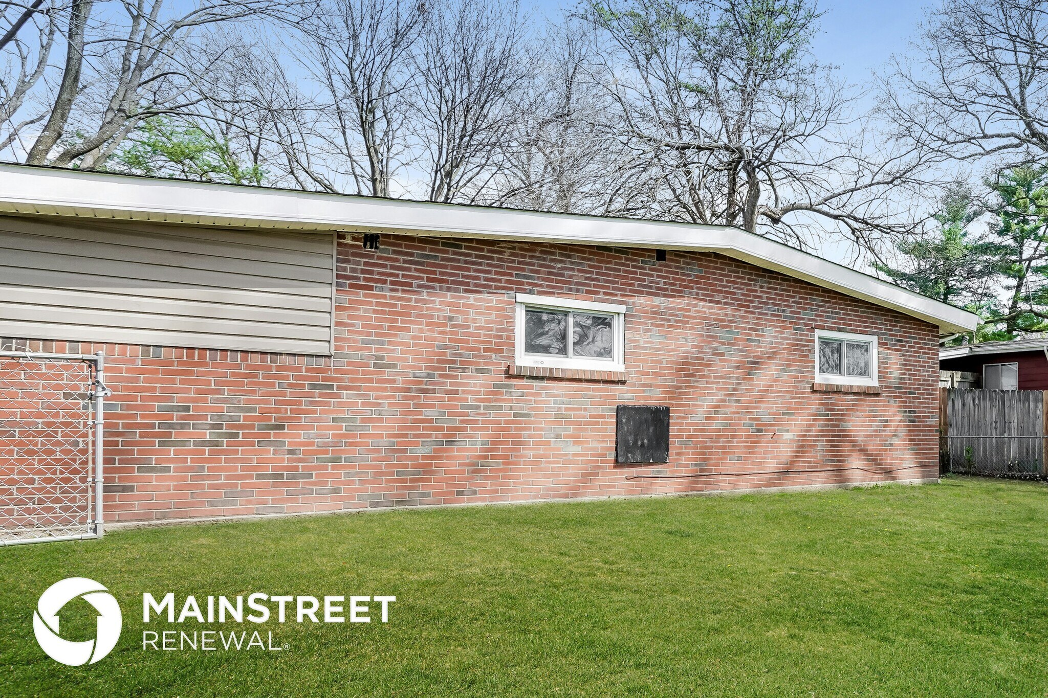 Building Photo - 6910 Woodhurst Dr