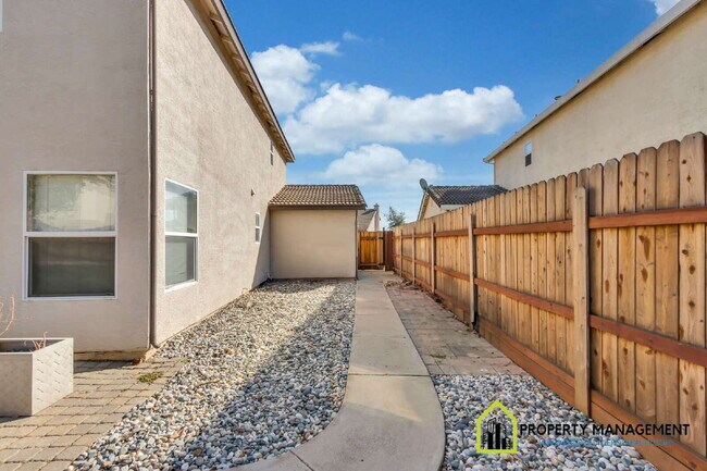 Building Photo - 5-Bedroom Residence Ready for Immediate Move-In