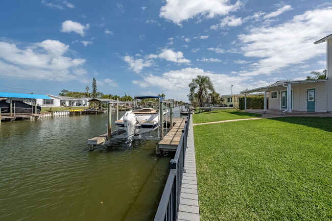 Building Photo - Gorgeous deep water canal front home