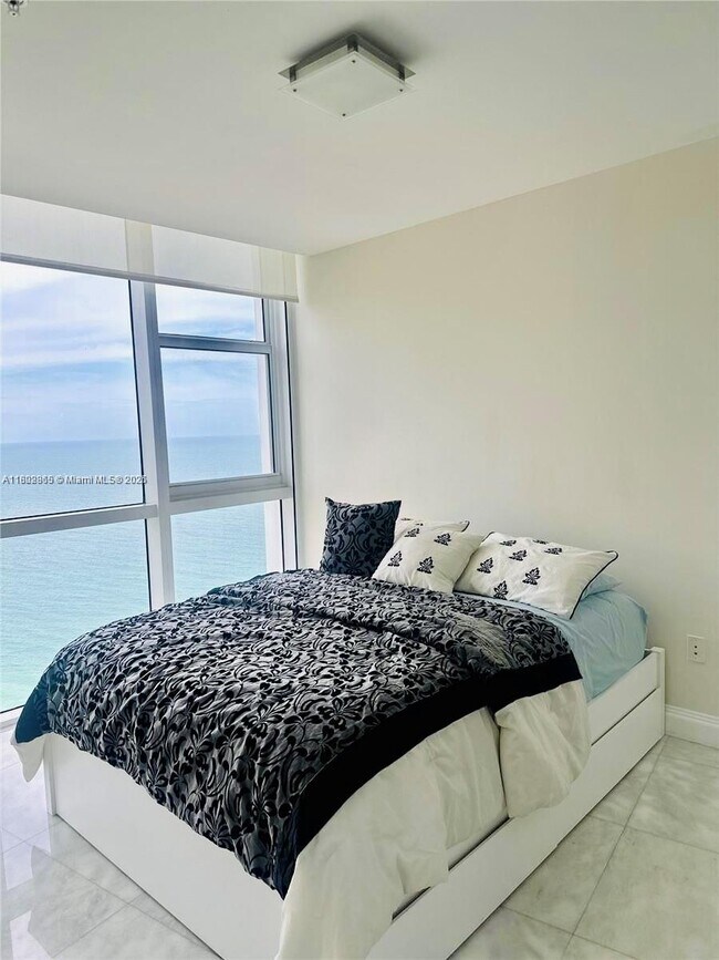 Building Photo - 18201 Collins Ave