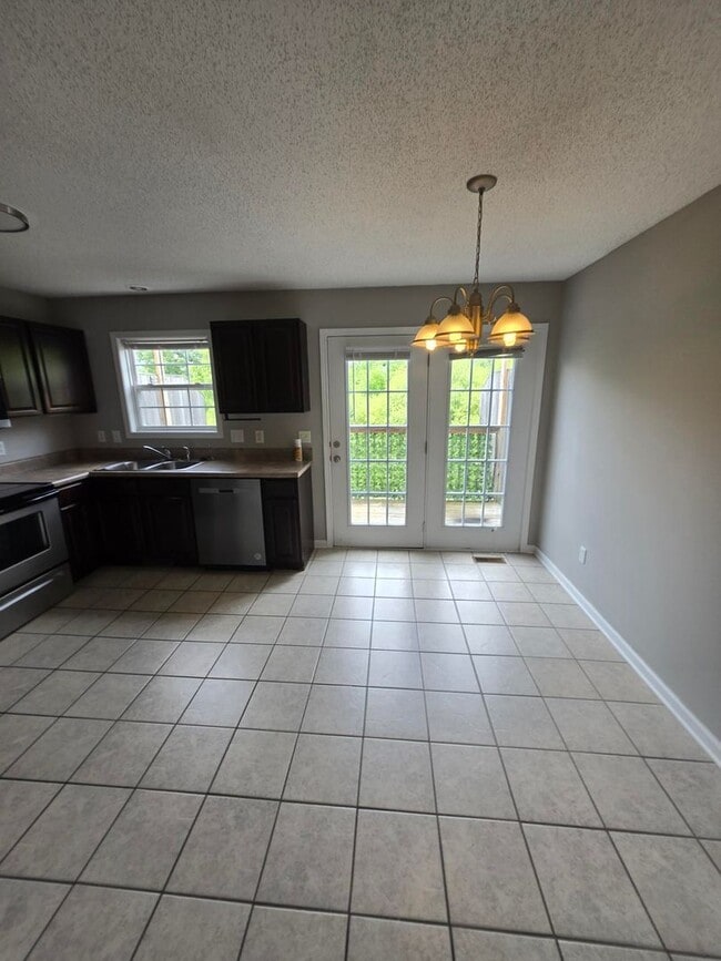 Building Photo - Spacious 2-Bedroom Townhome – Private Deck...