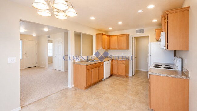 Building Photo - Spacious Home with Fenced Backyard!