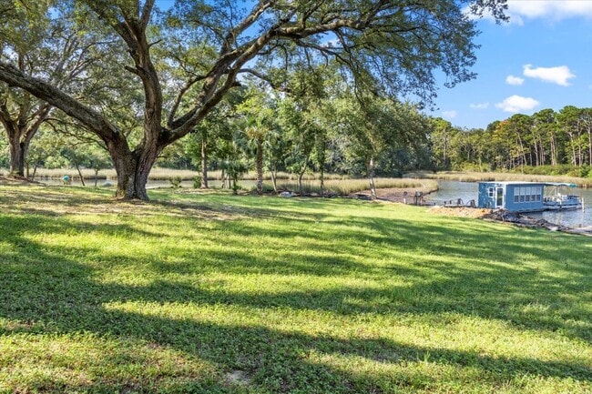 Building Photo - Beautiful Water-View 2BR/2BA Townhome – Flexible Leases, Pet Friendly, and ½ Off Deposit for Acti...