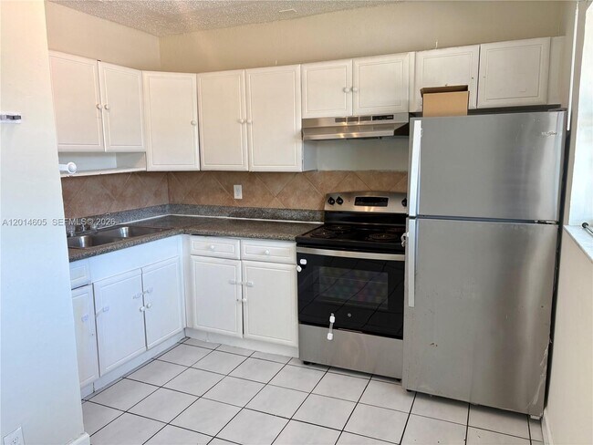 Building Photo - 651 NW 42nd Ct