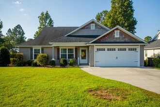 Building Photo - Modern 4-Bedroom Home with Screened Porch ...