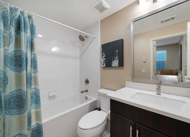 Building Photo - Tucked within the Hollywood Hills in a gated community