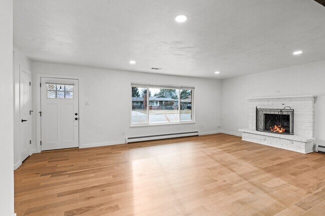 Building Photo - Charming and Renovated 4 Bedroom 2 Bathroom Home with Large Fenced Yard