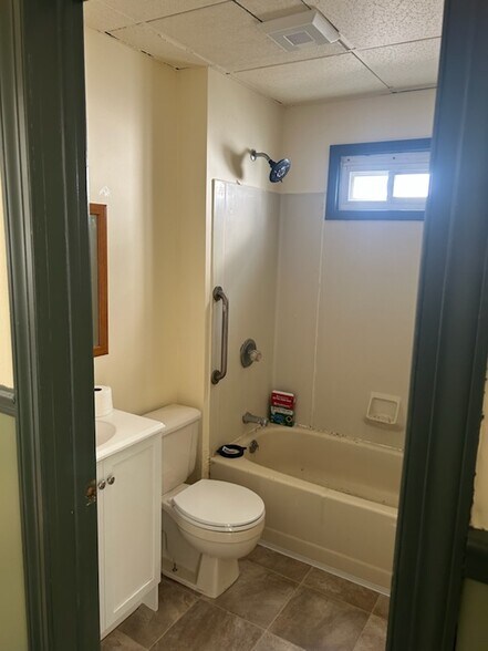 bathroom with new ceiling light and exhaust fan - 321 Odell Ave