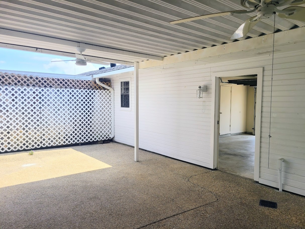 Private Patio give covered access from garage to back door - 12439 Coursey Blvd