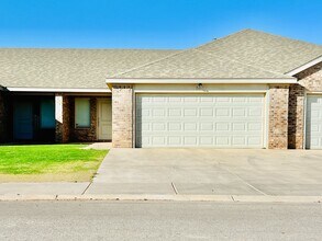 Building Photo - PRE-LEASING FOR JUNE OR JULY! Spacious 3-Bedroom Townhouse Near Texas Tech