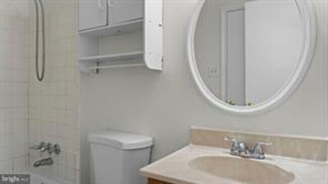 Building Photo - RENOVATED TOWNHOUSE WITH 3 BEDROOMS AND 1.5 BATHS, FENCED BACKYARD