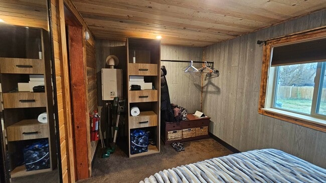 Building Photo - Fully Furnished Studio with Fenced Yard