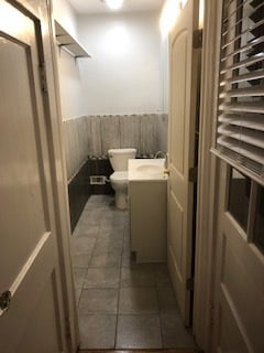 Half bath handy right off the kitchen. - 116 Bowmar St