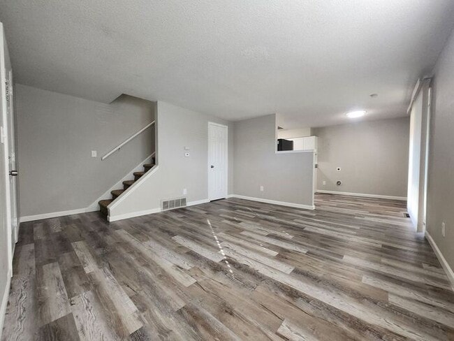 Building Photo - 2-Bedroom Townhome with Fenced Backyard and Modern Updates! |Utilities Included!