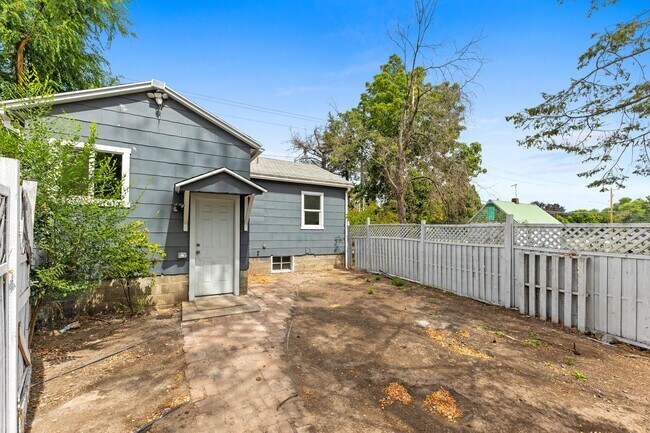 Building Photo - Updated Dishman Cottage with HUGE Shop - 2BR + Bonus Room!