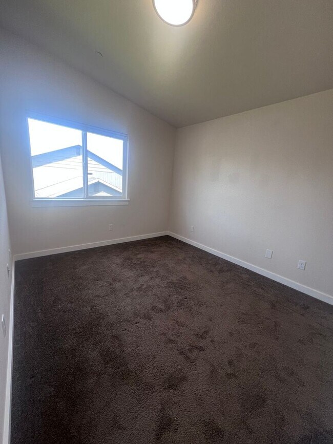 Building Photo - 2 Bedroom 1 bath house with extra large double car garage and extra storage space!