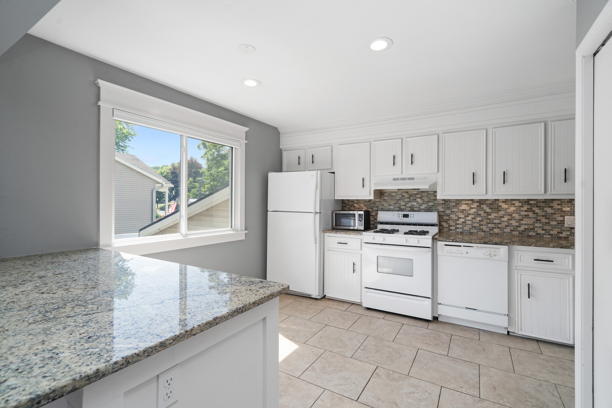 Light abounds in this large kitchen - 223 E Division St