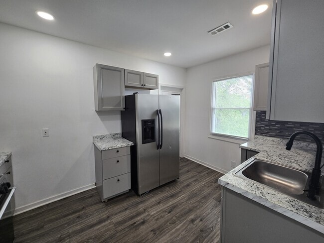 Building Photo - 9340 Moffat Ave