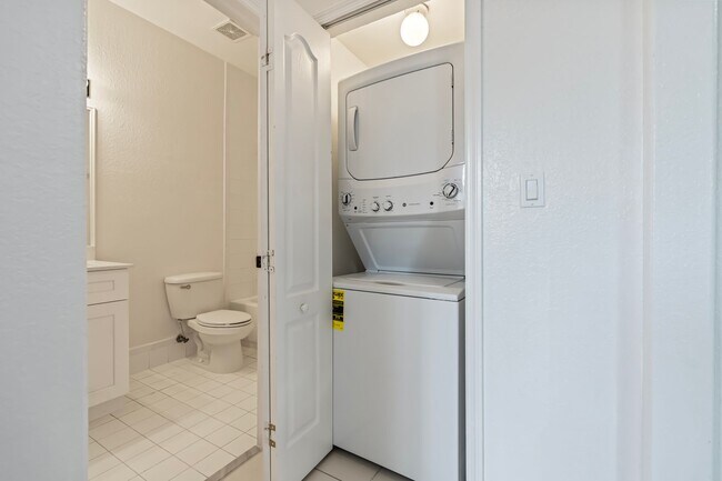 Building Photo - 2-bath condo on the 2nd floor with a newly...