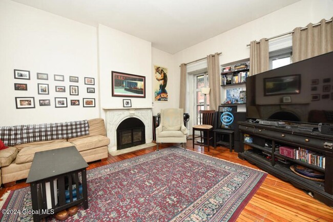 Living room with gas fireplace - 285 Lark St