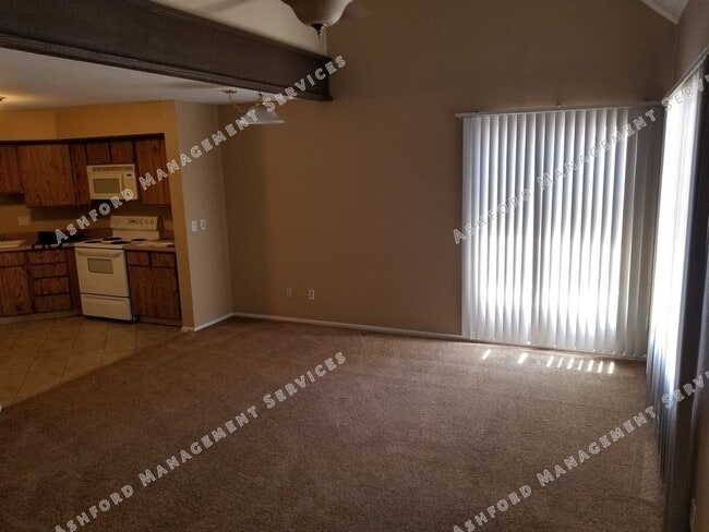 Building Photo - 2 STORY TOWNHOME WITH ATTACHED GARAGE WATER INCL