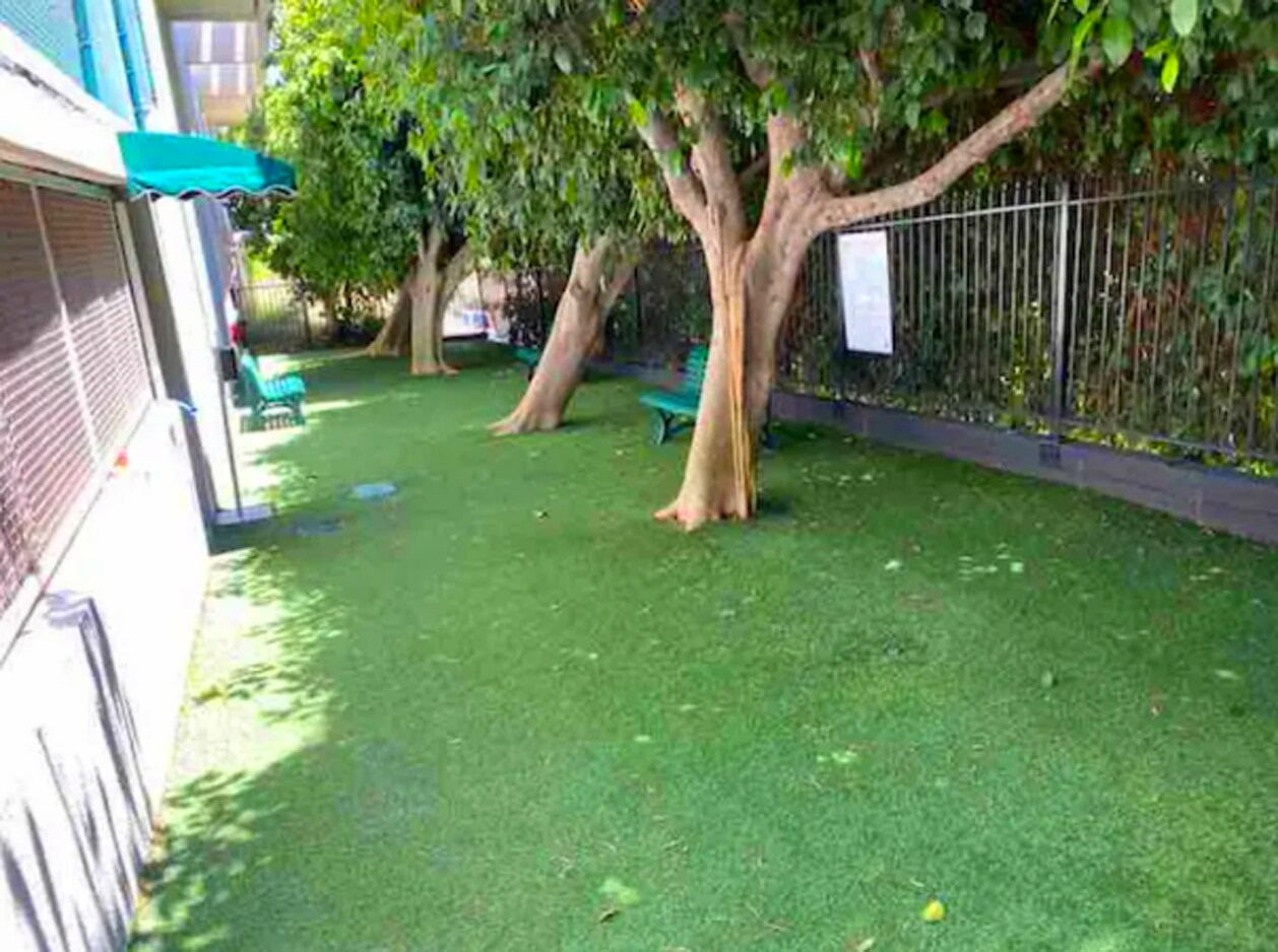 The private outdoor dog park, with benches - 1131 Alta Loma Rd