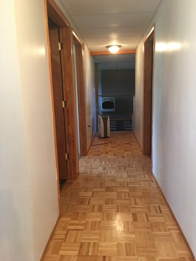 Building Photo - Beautiful secluded 4 bedroom 2.5 bath home with 2 stall detached garage and descent sized yard