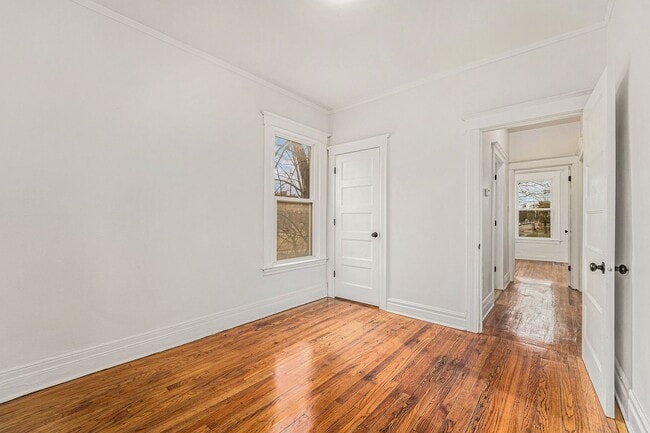 Building Photo - Charming Haven: Dunedin's Six-Family Gem